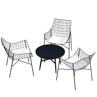 China Outdoor modern patio leisure mesh wrought iron mesh recessed chair balcony table and chair combination for sale