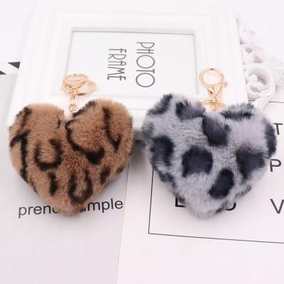 China Souvenir Gifts Promotion Leopard Heart Shape Fluffy Pom Pom Keychain Key Chain For Girls for sale