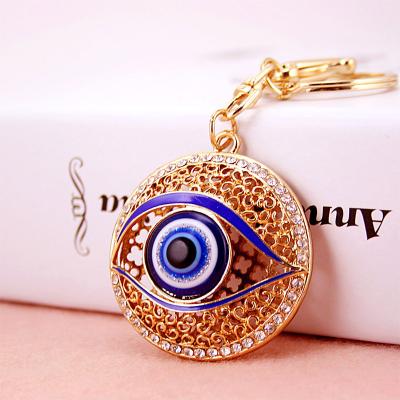 China Souvenir Gifts Promotion Rhinestone Eye Car Key Chain Hip Hop Metal Accessories Metal Accessories Pendant Gift Small for sale