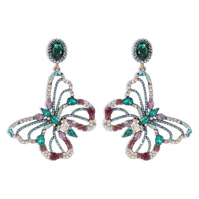 China Exaggerated Hollow Metal Punk Wing Drop Earrings Large Rhinestone Butterfly Earrings for sale