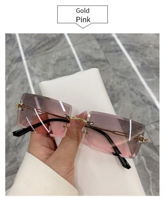 China Fashion Glasses Vintage Shape 2023 New Sunglasses Gradient Rimless Summer Shades Frameless Rectangle Displacement Sun Glasses For Women for sale