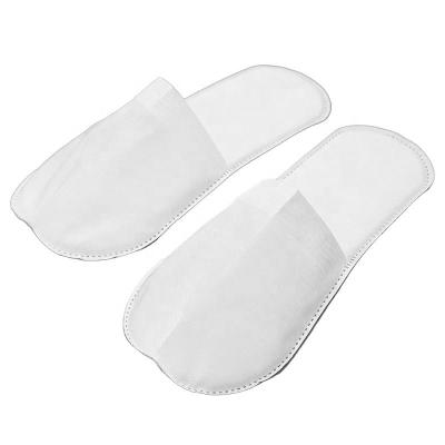 China Light weight the new hotel is convenient for business trip, wearing and receiving guests' disposable non-woven slippers for sale