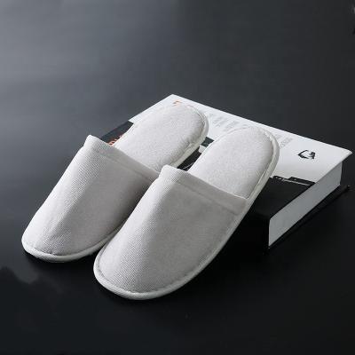 China Zhenmei lightweight non-woven fabric non slip thickened breathable disposable slippers for hotel housekeeping reception guests for sale