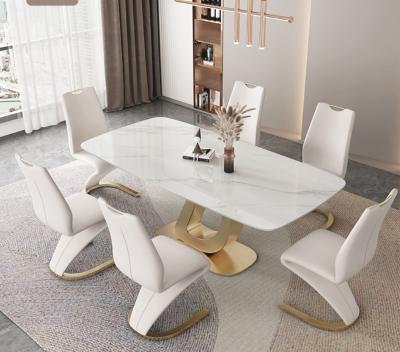 China Luxury High End Dining Table (Height) Adjustable Rock-Slab Dining Table Stainless Steel Dining Table And Chair Combination Modern Simple Light New for sale