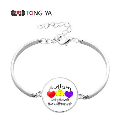 China Newest Autism Awareness Casual / Sporty Glass Cabochon Charm Adjustable Silver Stretch Chain Bracelets for sale