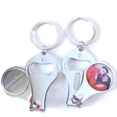 China Gift Bottle Opener Nail Wrapping Keyholder Cutter Personalized Design Wedding Gift Metal Key Chain and Opener for sale