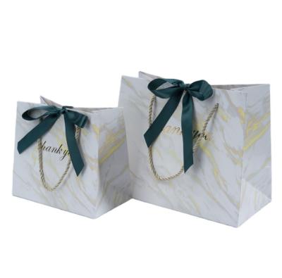 China Recyclable Marble Texture Bronzing Horizontal Version Blank Card Paper Bag With Hand Gift Thank You Bag for sale