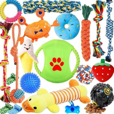 Cina Dog Puppy Toys Pack, Puppy Chew Toys for Fun Teeth Cleaning, Dog Squeak Toys,Treat Dispenser Ball, Tug of War Toy in vendita