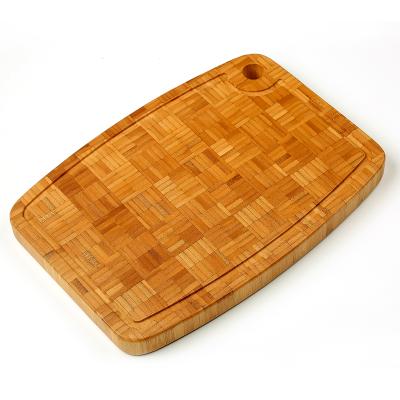 China Hot Sale Wholesale Viable End Grain Cutting Board Thick Bamboo Cutting Plates with Juice Grooves and Round Wall Hole for sale