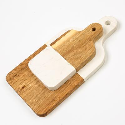 China Sustainable Paddle Shape Eco-Friendly Acacia And Cake Cheese Splicing Durable Marble Board Set Of 2 Cutting Boards Chopper With Handle for sale