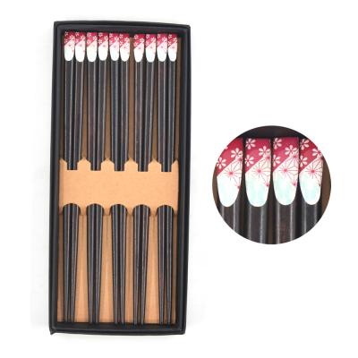 China Viable 5 Pairs Set Lightweight Korean Japanese Style 8.8 Inches/22.5cm Wooden Reusable Chopsticks With Natural Flowers Printing for sale