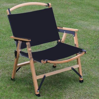 China Modern Custom Folding Beach Chair Portable Wood Grain Curved Chairs Lounge Black Beach Chair for sale