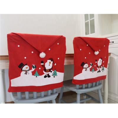 China Christmas Indoor Party Plain Decoration Christmas Santa Claus Red Hat Christmas Chair Back Cover for sale