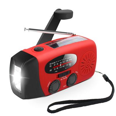 China Best PORTABLE Emergency Mini Hand Crank Am Fm Solar Switch Radio With Led Flashlight for sale