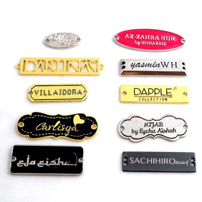 China USA Environmental Sustainable Standard Cheap Custom Brand Engraved Zinc Alloy Clothing Tag Metal Logo Shoes Garment Label for sale