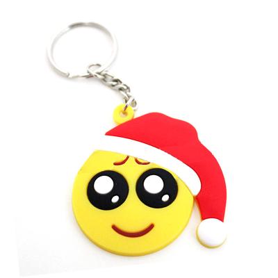 China Wholesale Custom Cute Smiley Face Keychain Soft Smile Emotion Soft PVC All Type Cute Rubber Emoticon Keychains With Santa Hat for sale