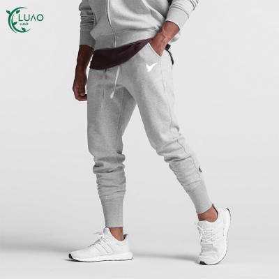 China Plain Soft Stretch Mens Breathable Sweatpants Sweat Wicking Cotton Plus Size Training Pants Gym Wear For Workout Fitness for sale