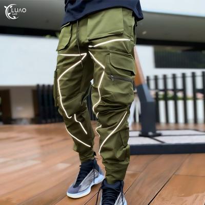 China New Style Quick Dry Casual Men's Breathable Pants With Stripe Reflective Polyester Jogging Workout Fitness Wear With Pockets for sale