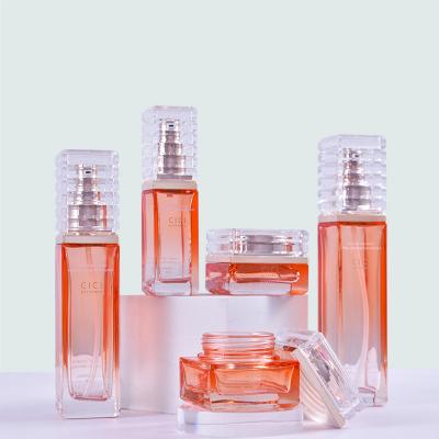 China 30g 50g 40ml 100ml 120ml New Design Square Container Eco-friendly Recyclable Thick Bottom Clear Cosmetic Lotion Pump Serum Glass Bottles And Jars Set for sale