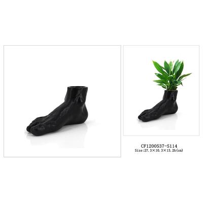 China CLASSIC Resin Black Feet Shaped Flower Pots And Planters Pot Flower for sale