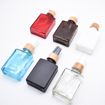 China Wholesale Square Glass Bottle Perfume Bottle With Pump Spray Lid for sale