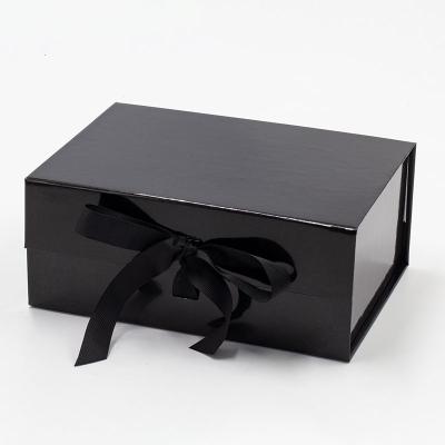 China Wholesale Recyclable Custom Lamination Shiny Black Color Style Ribbon Closure Gift Box Magnetic for sale