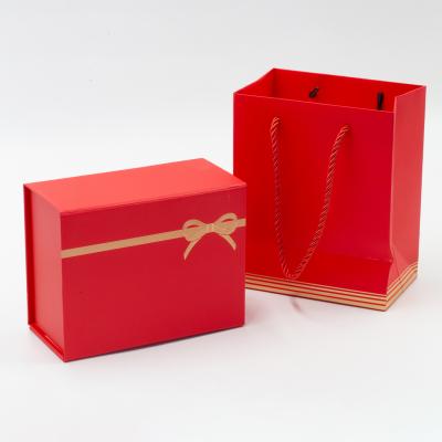 China Low moq materials red color recycled custom printing gift box with deep paper purse box for christmas gift present packing box with bow for sale