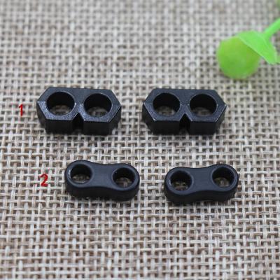 China Cheap Wholesale Nickel Free Garment Accessories Black Two Hole Rope Stopperd for sale