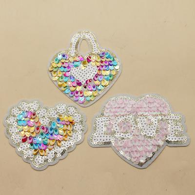 China Viable Wholesale Custom Apparel Sequin Heart Iron Sew On Embroidery Patches For Garment for sale