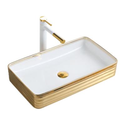 China Clean Easy Emboss White Gold Basin Sink Bathroom Table Top Lavabo Modernos Dorado Vessel Sink Gold Rim zu verkaufen