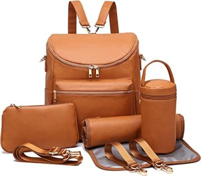 China Waterproof PU Leather Baby Backpack Diaper Bag With Changing Station Mummy Functional Luxury Backpack For Women Diaper Bag Backpack Baby Di for sale