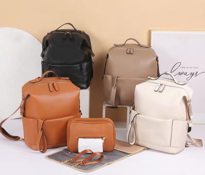 China Fast Delivery Water Resistant Low MOQ Luxury Design Diaper Bags Vegan Leather Baby Bags For Mom And Dad Factory Directly Supply Changing Bags for sale