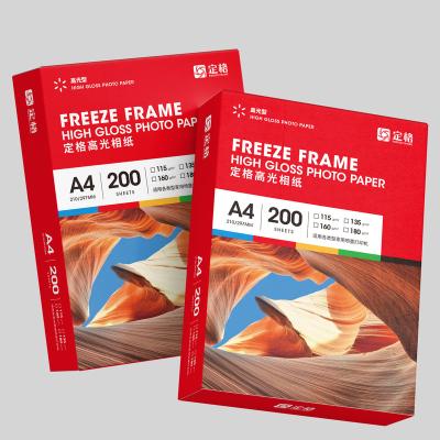 China Instant Dry Photo Paper 135g Inkjet Photo Paper High Glossy Cast Coated Photo Paper A4*100 Sheets for sale