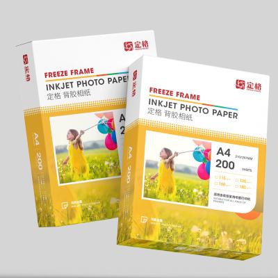 China 105g Photo Paper Instant Dry Self Adhesive Glossy Inkjet Photo Paper Melt Coated Photo Paper A4 Size Roll Size for sale