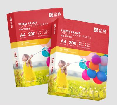 China 135g Photo Paper A4*50 Sheets Inkjet Melt Paper Instant Dry Self Adhesive Glossy Coated Photo Paper Sticky Photo Paper for sale