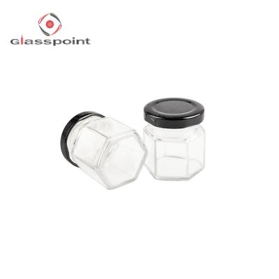 China Freshness Preservation 45ml Hexagonal Jam Glass Jar With Metal Lid for sale