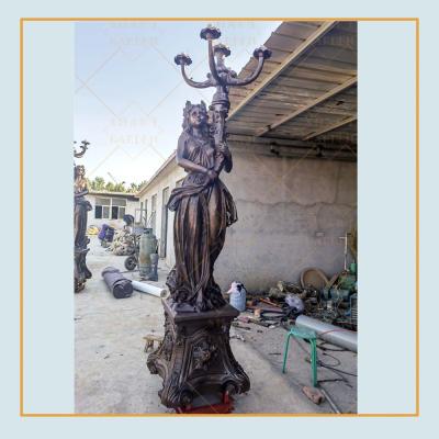 China Europe 2021 Hot Sale Nude Statue Bronze Angel Figure Sculpture Lamp For Garden Decoration for sale