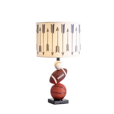 China Contemporary Basketball Book Resin Table Lamp Minimalist Children's Room Fabric Desk Light Boy Bedroom Bedside Night Light for sale