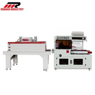 China Automatic Food Shrink Wrapping Machine Heat Tunnel Tube Wrap Packaging Machine for sale