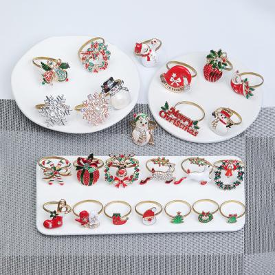 China 2022 Viable Elk Christmas Metal Napkin Rings Weave Christmas Tree Snowflake Napkin Ring Napkin Button Table Decoration for sale