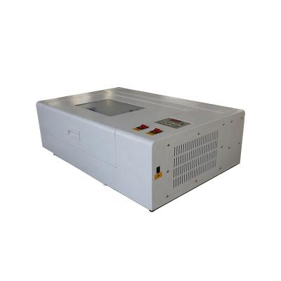 China Affordable Water Cooled 40W 50w 3020 Mini Co 2 Laser Engraving Machine For Cutting Wood Plastic Acrylic Leather Nonmetal With CE for sale