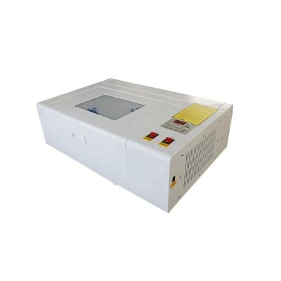 China Factory Price 3020 50w 60w CO2 Laser Engraving Machine Mini Air Cooled Acrylic Wood Glass Laser Crystal Engraving Machine for sale