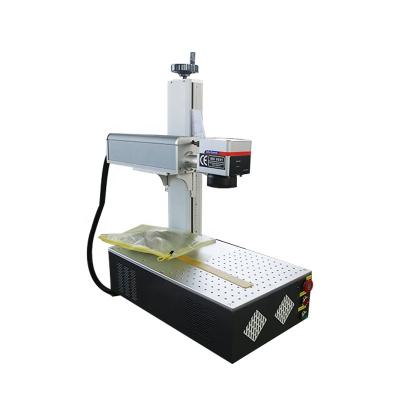 China Best Selling Air Cooled Printing Machine One Piece Mini Lazer Laser Engraving 20w 30w 50w Raycus Fiber Laser Marking Machine for sale