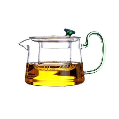 China Wholesale 550ml Stocked Heat Resistant Glass Teapot with Tea Strainer and Colorful Handle for sale