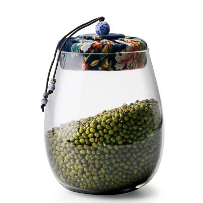 China Freshness Preservation Kitchen High Capacity Airtight Glass Tea Storage Jar With Cork Lid Cloth for sale