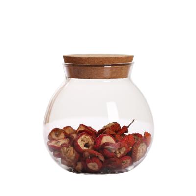 China Heat Resistant Glass Cookie Storage Tea Freshness Preservation 500ml Ball Shape Airtight Candy Jar for sale