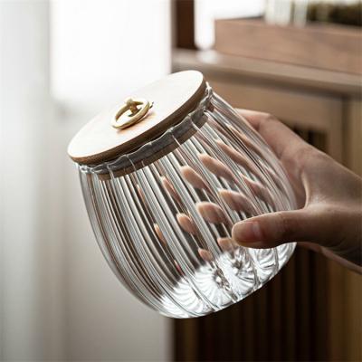 China Freshness Preservation Household Kitchen Storage Jar 650ml 750ml Empty Petal Glass Storage Jar for sale