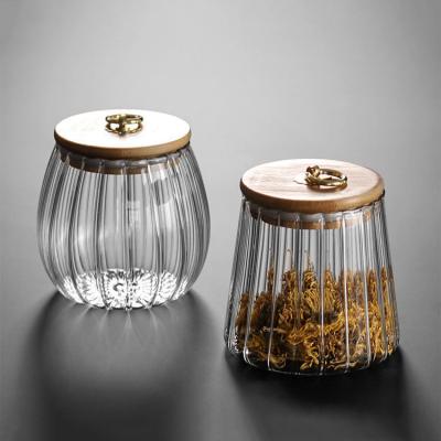 China Freshness Preservation Petal Storage Jar 650ml 750ml Borosilicate Glass Pumpkin Top Shaped Airtight Storage Jar for sale