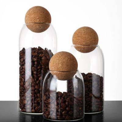 China Custom High Freshness Preservation 500ml 800ml 1200ml Borosilicate Glass Jar With Cork Ball Lid for sale