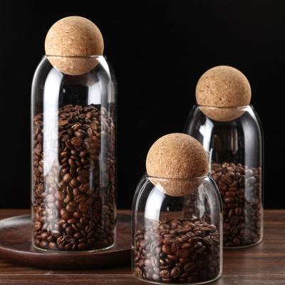 China Freshness Preservation 800ml Spice Glass Jar Food Storage Lead Free Glass Jar With Cork Ball Lid for sale